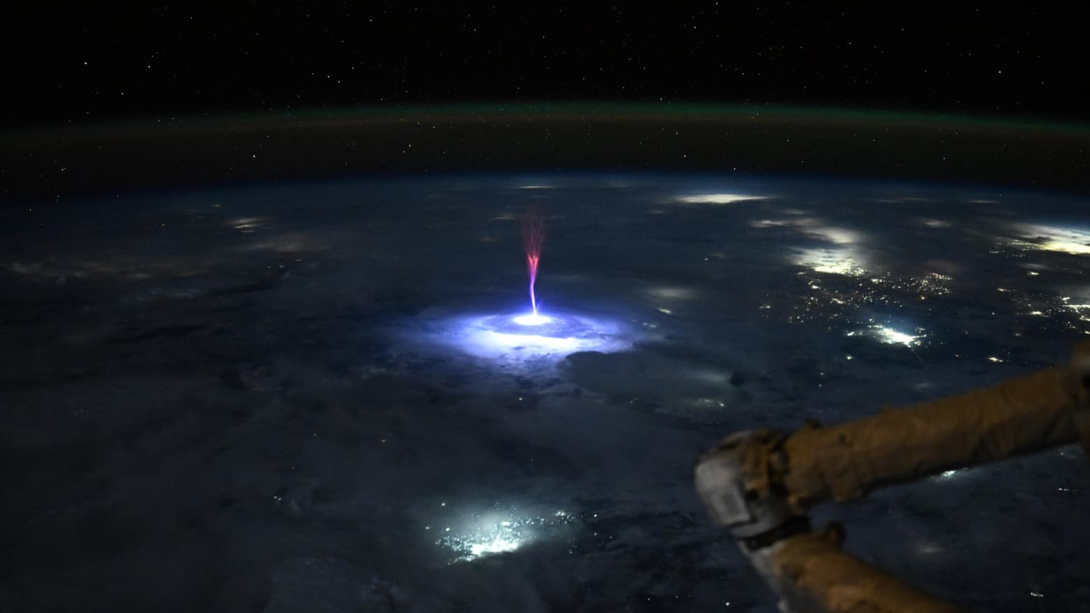 ISS astronaut captures a rare phenomenon from orbit — a giant 'sprite' above a thunderstorm - Space